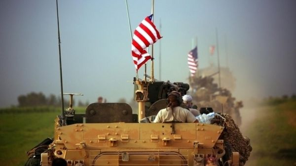 US flag still seen, despite Syria pull-out order (AFP/file photo)