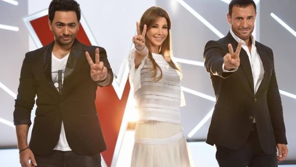 Celebrities Nancy Ajram, Kazem el Saher and Tamer Hosny are set to judge young talents on The Voice Kids Arabia. (Facebook)