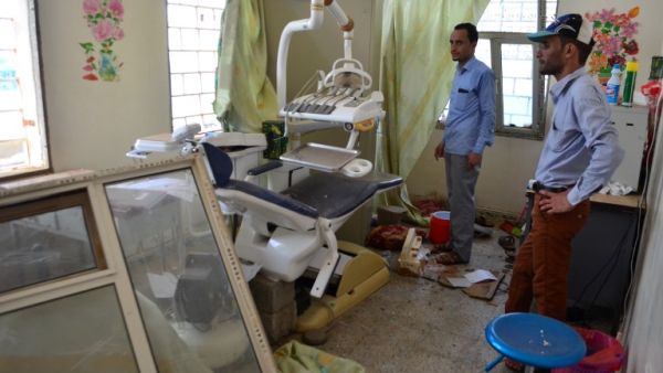 Yemenis inspect the damage in a room at an hospital operated by Doctors Without Borders (MSF), on August 16, 2016 in Abs, in the northern province of Hajja, a day after the hospital was hit by an airstrike by the Saudi-led coalition. (AFP/Stringer)