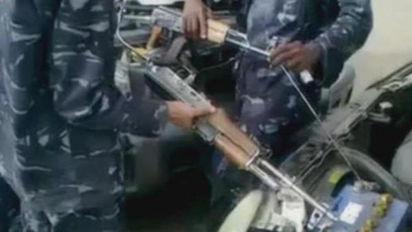 Two Yemeni soldiers rigging up their AK-47 starter improv. [YouTube]