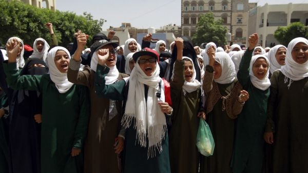 Yemeni students shout slogans during a rally at a school in the capital Sanaa protesting the deployment of US Special Forces to their country, amid the ongoing conflict in the impoverished Arab state, on May 23, 2016. (AFP/Mohammed Huwais)