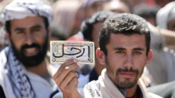 محتج مناهض للحكومة يشارك في تظاهرة في صنعاء
