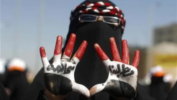 متظاهرة يمنية تطالب بمحاكمة صالح