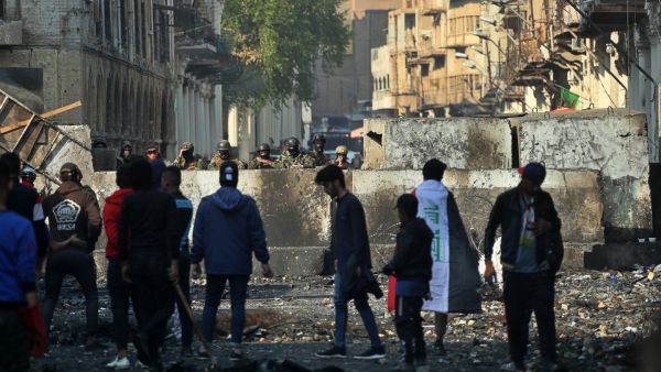 13 قتيلا في إطلاق نار على المتظاهرين في بغداد