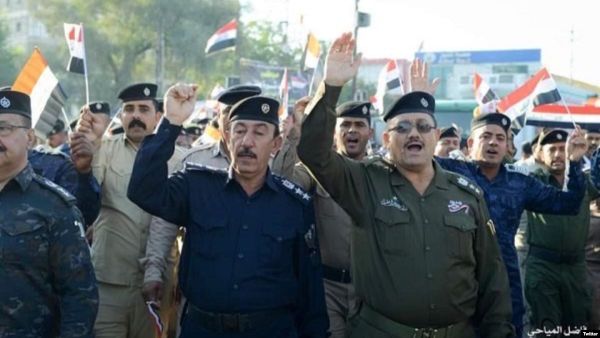 مسيرة لعناصر من قوات الامن في كربلاء