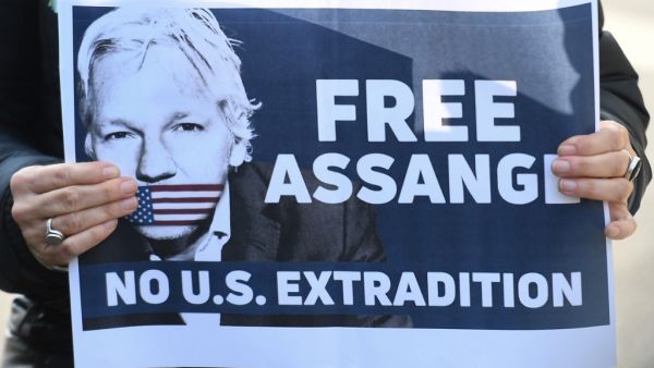 Placard calling for freedom for WikiLeaks founder Julian Assange (AFP)