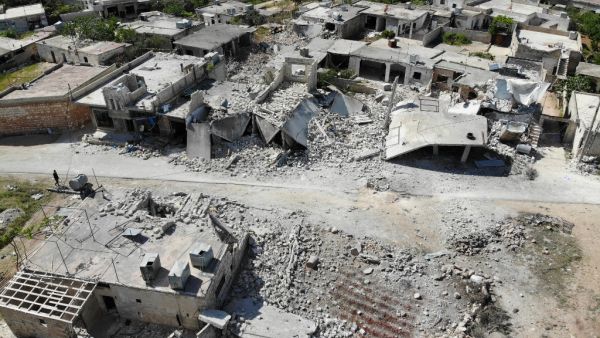 Destruction in the village of Kansafrah following reported shelling on the rebel-held Idlib province  (AFP)