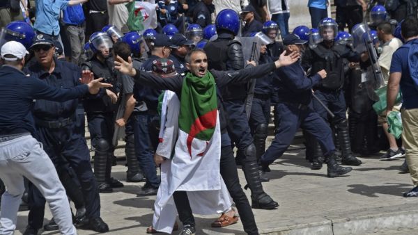 An Algerian protester reacts during an anti-government demonstration  (AFP)