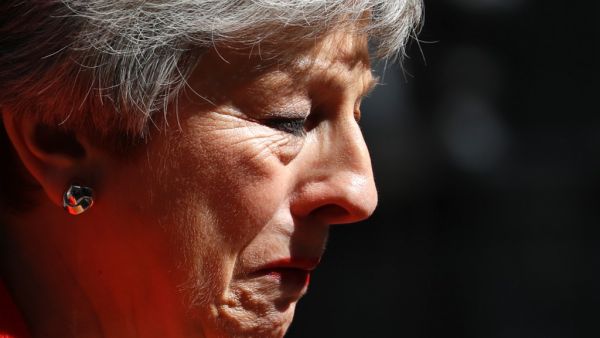 Britain's Prime Minister Theresa May reacts as she announces her resignation outside 10 Downing street in central London on May 24, 2019. Beleaguered British Prime Minister Theresa May announced on Friday that she will resign on June 7, 2019 following a Conservative Party mutiny over her remaining in power. Tolga AKMEN / AFP