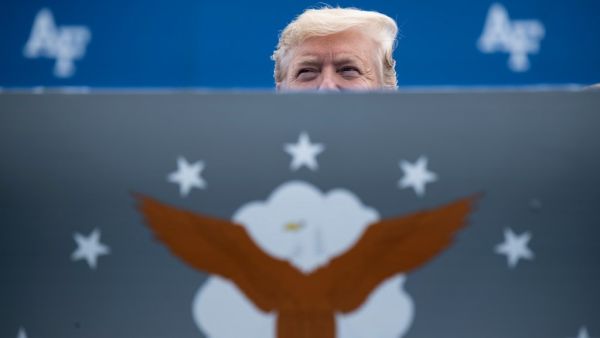 US President Donald Trump listens during the 2019 graduation ceremony at the United States Air Force Academy May 30, 2019, in Colorado Springs, Colorado.  Brendan Smialowski / AFP