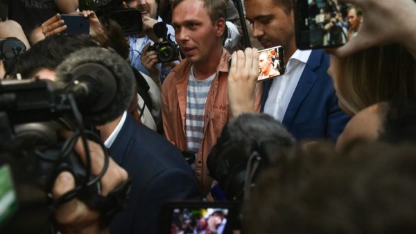 Russian investigative journalist Ivan Golunov (C), charged of 'illegal production or sale of drugs', leaves Russian Head Investigative Department's office in Moscow  (AFP)