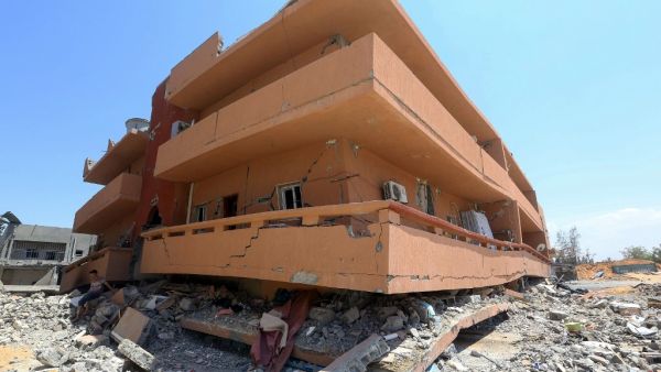 A partially demolished building located near the Yarmouk military compound, controlled by the Libyan Government of National Accord (GNA) forces (AFP)