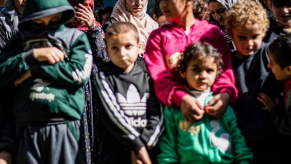 Syrian Kurds have repatriated 25 women and children from Iraq's Yazidi minority (AFP)