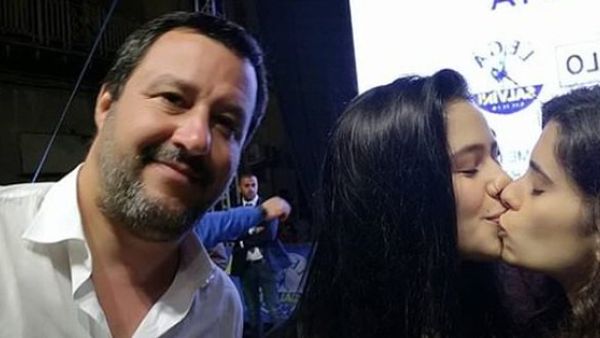 The two women decide to kiss one another as they stand next to the Italian Deputy Prime Minister Matteo Salvini at a rally in Caltanissetta, Sicily (Twitter)