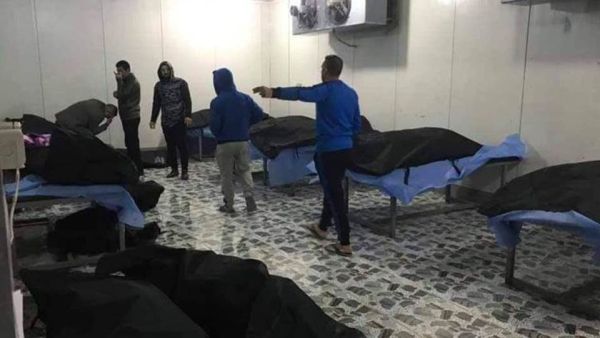 اشلاء قتلى الغارة الاميركية قبل دفنها 