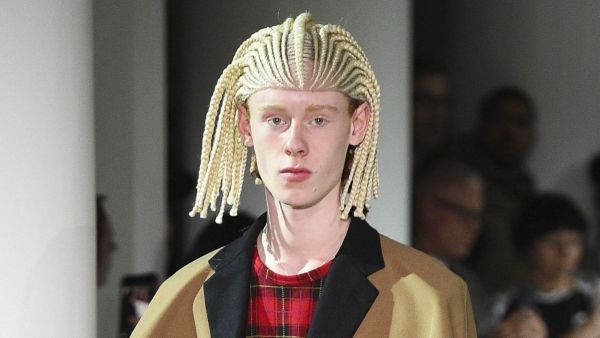 العلامة التجارية اليابانية الشهيرة Comme des Garcons 