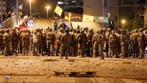 قتيل بمشاجرة بين أنصار حزب الله وأمل بسبب لافتات