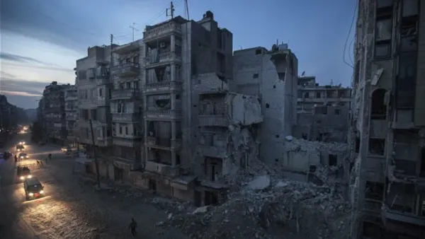 Destroyed buildings, including Dar Al-Shifa hospital, are seen on Sa'ar street in Aleppo, Syria. /AFP