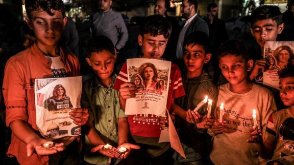 In Pictures: Funerals Held After Palestinian Journalist Killed