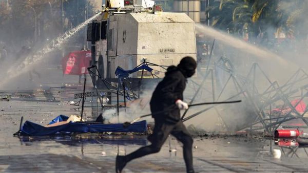 Three Shot in Chile May Day Clashes (AFP)