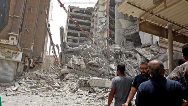 Iran Building Collapse Kills 4 Traps 80