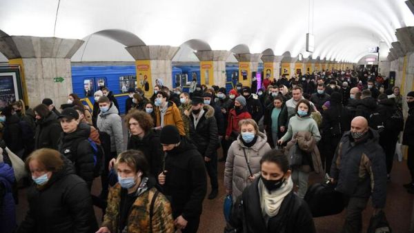 In Pictures: Ukrainians Flee, Take Shelter After Invasion 
