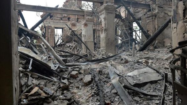This photograph shows a view of a school destroyed as a result of fight not far from the centre of Ukrainian city of Kharkiv, located some 50 km from Ukrainian-Russian border, on February 28, 2022. (Photo by Sergey BOBOK / AFP) Russian Airstrike Hits Civilian, Administrative Area in Kharkiv