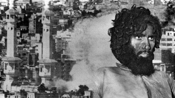 Smoke rises during fighting on Nov. 20, 1979, after a group seized the Holy Mosque. Right: The mastermind of the attack, Juhayman Al-Otaibi. (AFP)