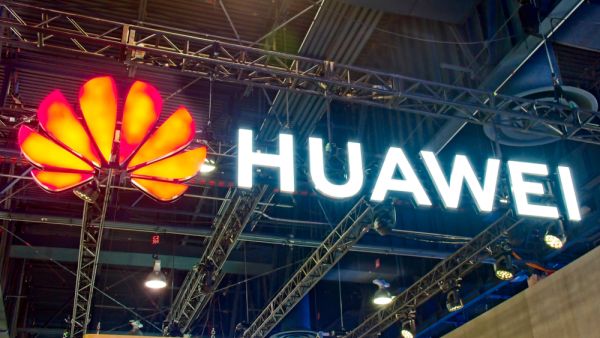 In this July 4, 2018, file photo, the Huawei logo is seen at a Huawei store at a shopping mall in Beijing. 