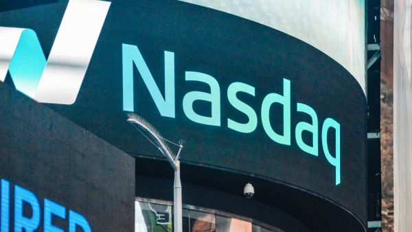 Tesla Lifts Nasdaq to Record-High Close