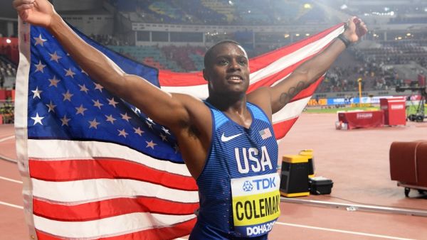 Christian Coleman of the United States celebrates after winning the gold medal in the men's 100 meters final during day two of the 17th IAAF World Athletics Championships in Doha