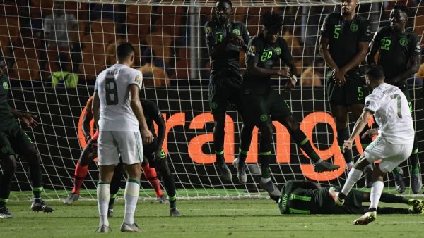 Senegal will play Algeria in Friday's Africa Cup of Nations final after Riyad Mahrez scored a free-kick in the 95th minute.