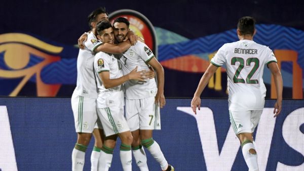 Algeria will face either Ivory Coast or Mali in the Africa Cup of Nations last eight after seeing off Guinea in comfortable fashion.