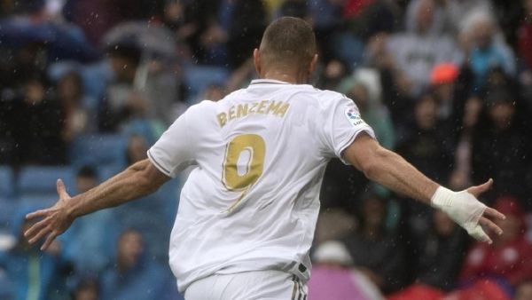 Karim Benzema scored twice in Real Madrid's 3-2 win over Levante as Eden Hazard made his long-awaited debut.