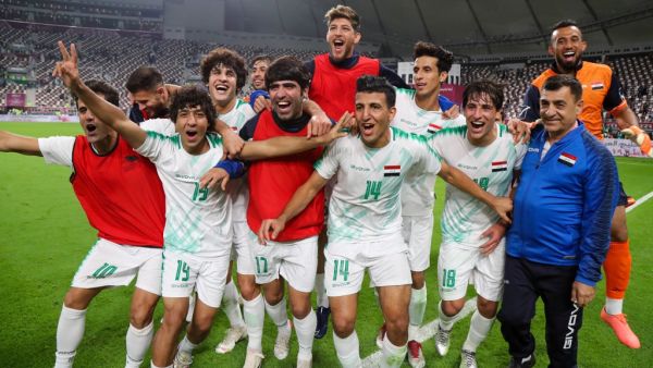 Iraq's players celebrate after the 24th Arabian Gulf Cup Group A football match between Qatar and Iraq at the Khalifa International Stadium in the Qatari capital Doha on November 26, 2019. KARIM JAAFAR / AFP