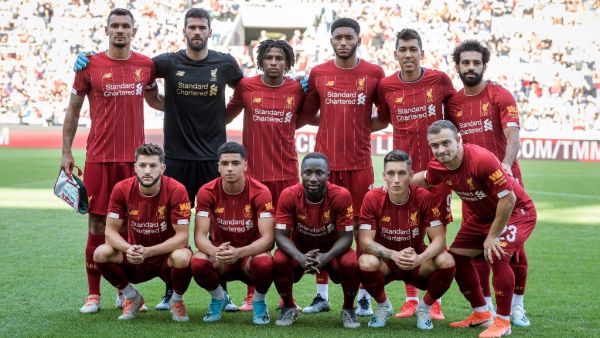 Mohamed Salah, Virgil van Dijk and Divock Origi were on target as Liverpool started the new Premier League season by beating Norwich City.