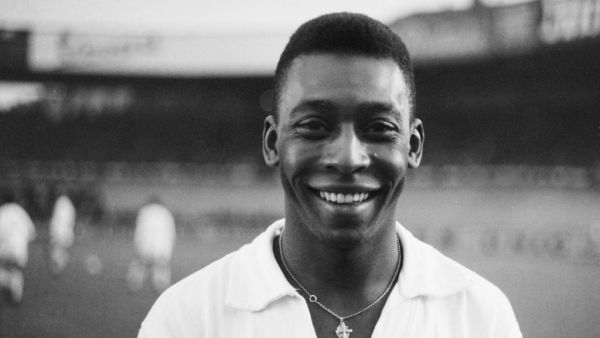 Brazilian striker Pelé, wearing his Santos jersey, smiles before playing a friendly soccer match with his club against the French club of "Racing", on June 13, 1961 (Photo by AFP)
