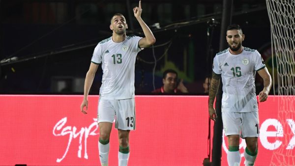 Islam Slimani (left)