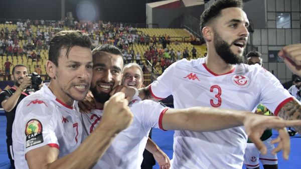  Tunisia scored three times in the second half to ease past surprise package Madagascar and set up a semi-final clash with Senegal. 