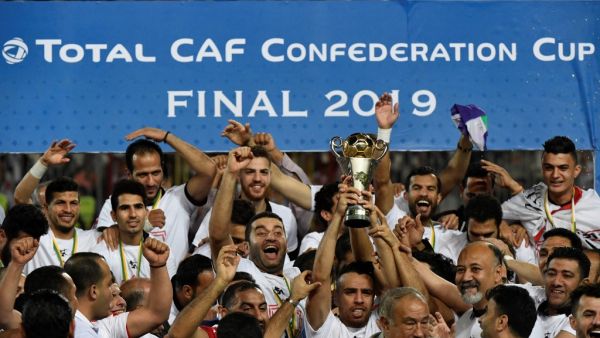 Egypt's Zamalek players celebrate with the trophy after they won the CAF Confederation Cup final football match between Egypt's Zamalek and Morocco's RSB Berkane