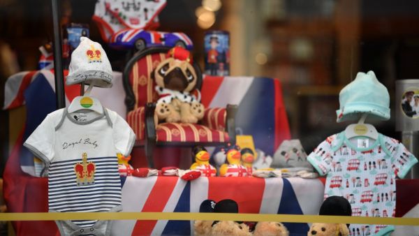 A Royal Baby outfit is pictured on display in a shop window as excitement builds in the town waiting for the birth of the child of Britain's Prince Harry and Meghan, Duke and Duchess of Sussex, on May 3, 2019. (Ben STANSALL / AFP)