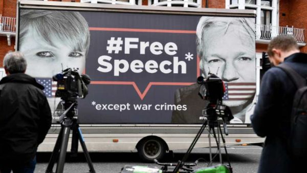 A billboard outside the Ecuadorean embassy showing WikiLeaks co-founder Julian Assange. (AFP/ File Photo)