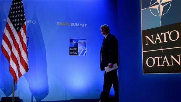 US President Donald Trump arrives for a press conference on the second day of the North Atlantic Treaty Organization (NATO) summit in Brussels on July 12, 2018. (AFP)