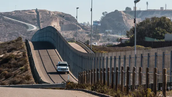 Border Patrol vehicle patrolling along the fence of the international border between San Diego, California and Tijuana, Mexico. (Shutterstock/ File Photo)