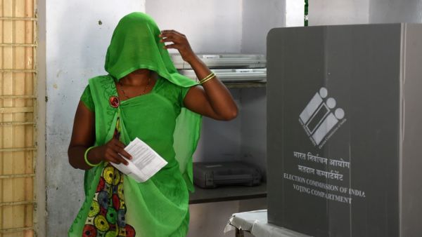 An Indian woman leaves after casting her vote during the third phase of general elections at a polling station in Ahmedabad on April 23, 2019. (AFP/ File)