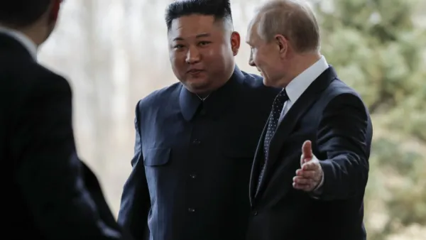 Russian President Vladimir Putin welcomes North Korean leader Kim Jong Un prior to their talks at the Far Eastern Federal University campus on Russky island in the far-eastern Russian port of Vladivostok on April 25, 2019.  (Alexander Zemlianichenko / POOL / AFP)