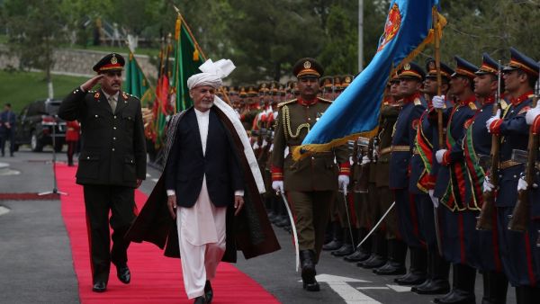 Afghan President Ashraf Ghani (C), inspects a guard of honor during the first day of the Loya Jirga, or the consultative council in Kabul, on April 29, 2019. (AFP/ File Photo)