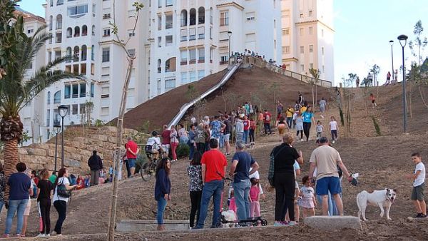 The chute saves a 10-minute walk from one street to another and it is reportedly Spain's biggest slide. (Daily Mail)