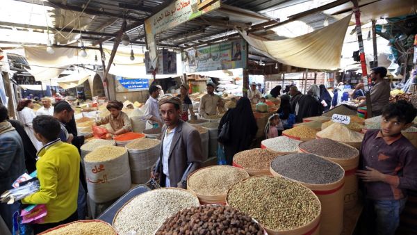 Yemenis shop in a market in the old city of the capital Sanaa, as the faithful prepare for the Muslim holy fasting month of Ramadan, on May 2, 2019. (AFP)