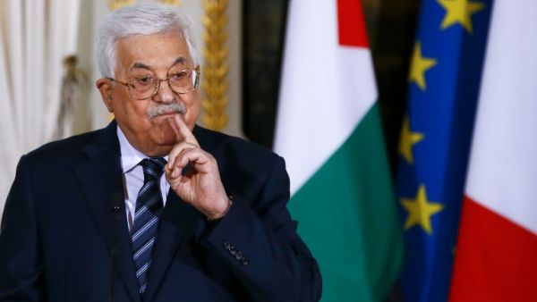 Palestinian Authority President Mahmoud Abbas gestures during a press conference with the French president, following a meeting at the Elysee presidential palace in Paris. (AFP Photo/Pool/Francois Mori)
